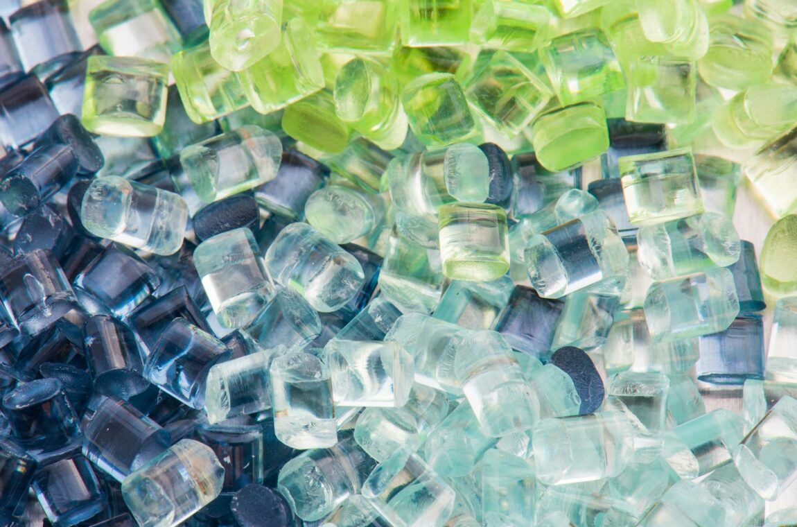 Polymers, various beads, in the colors green, blue and ice blue, semi-transparent