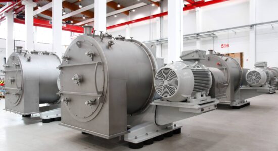 View into the centrifuge technology center of SIEBTECHNIK TEMA in Mülheim an der Ruhr, Germany. You can see several CONTURBEX centrifuges