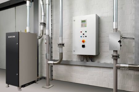 Pneumatic tube system with manual transmitter/receiver station and fully automatic transmitter station