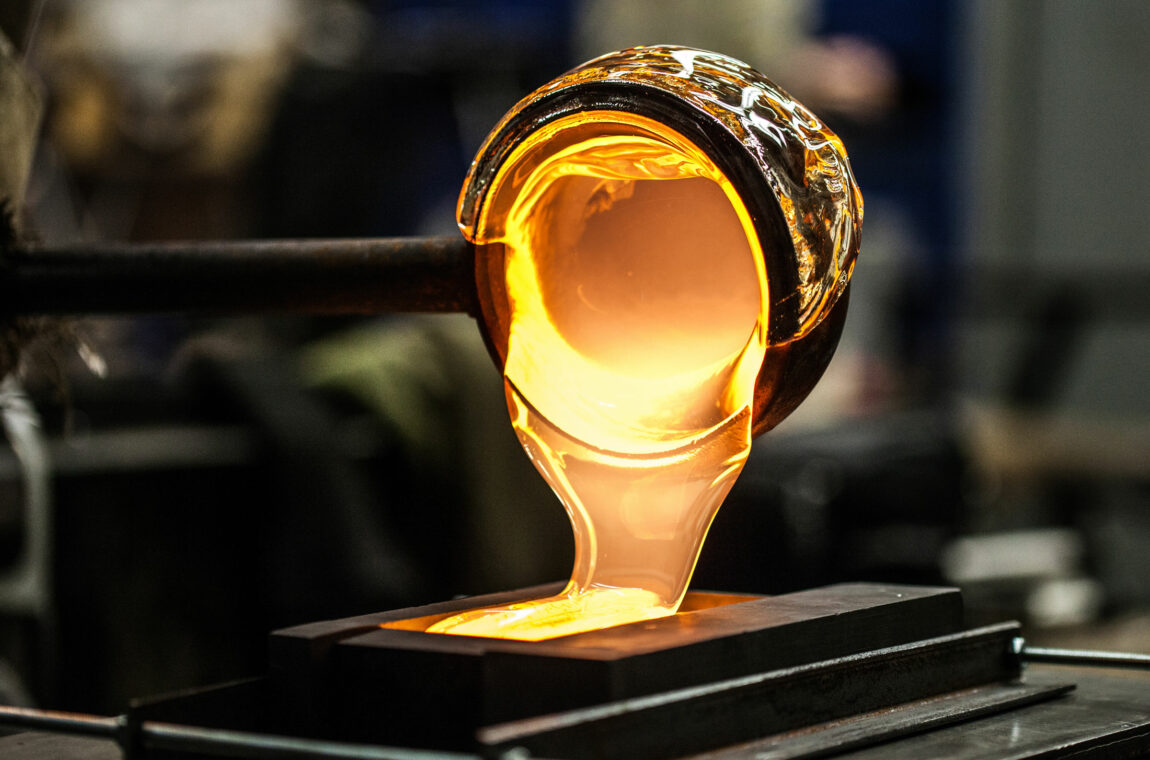 Liquid glass is poured into a mold