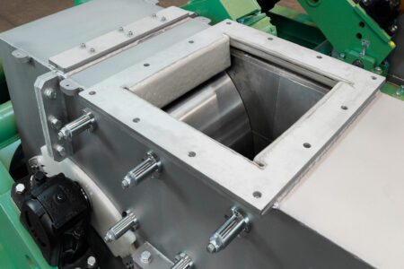 Double roller mill WS 600x400 with tungsten carbide crushing rollers for grinding high-purity silicon - view of material feed